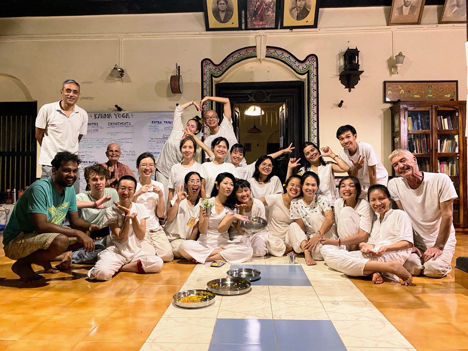 The karma-yoga community gathered in the hall