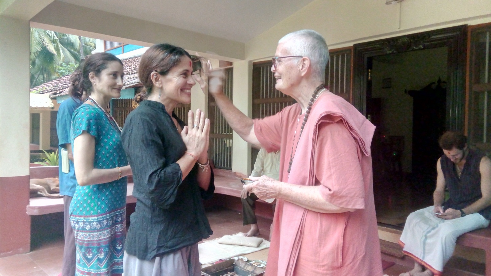 Swamiji welcoming a visitor on the veranda