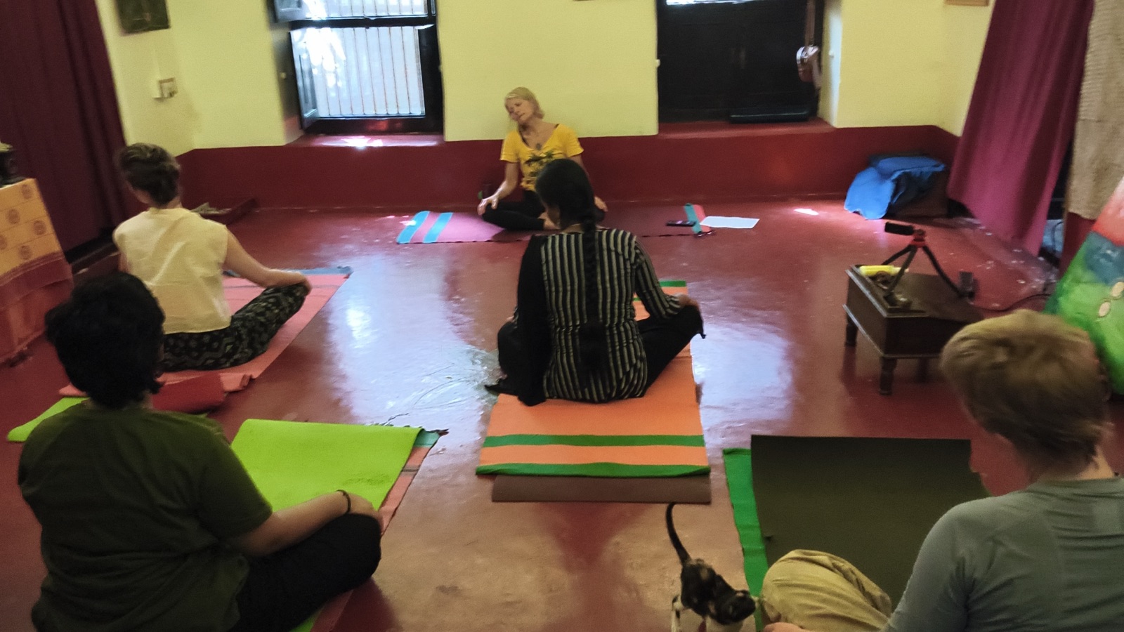 A small group practising with Swamiji