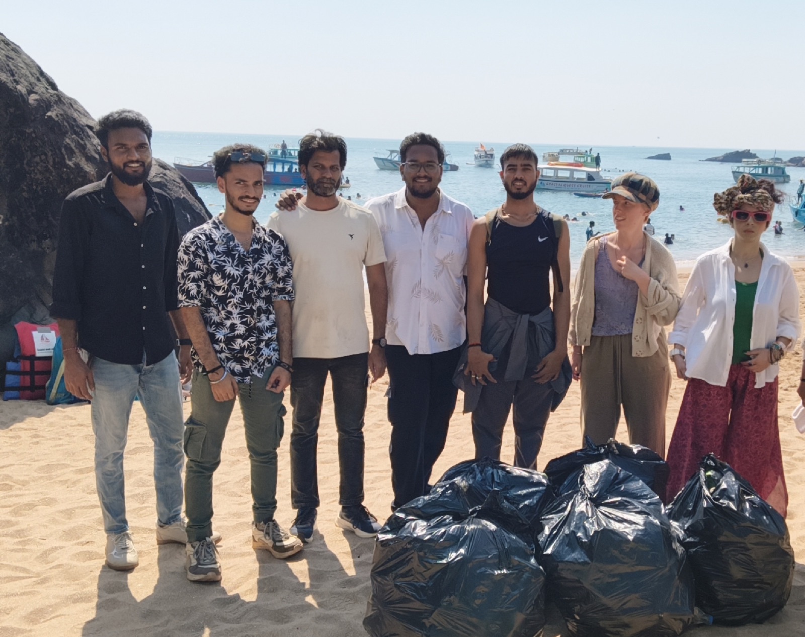 A beach clean-up team with the morning’s collection