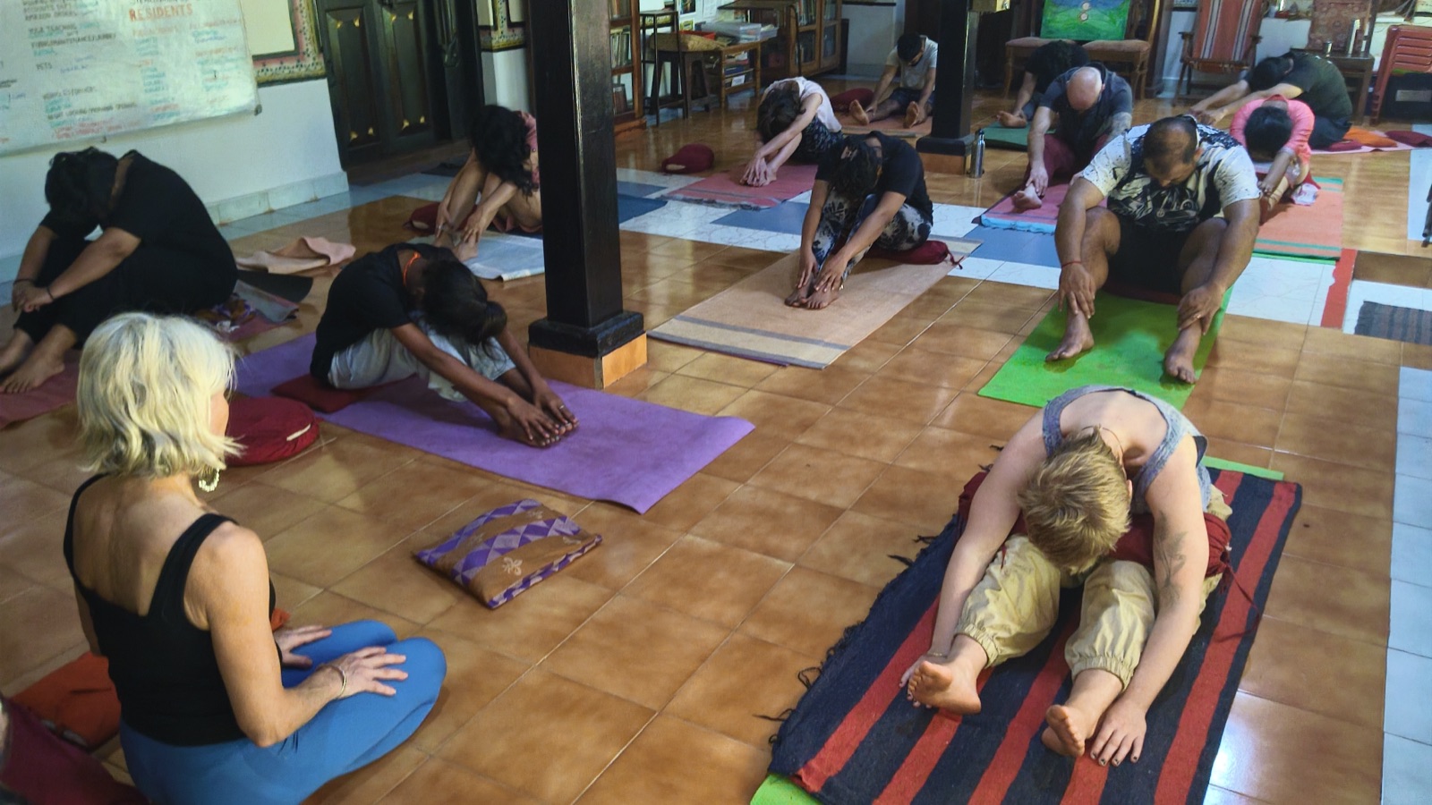 Morning asana practice in the hall