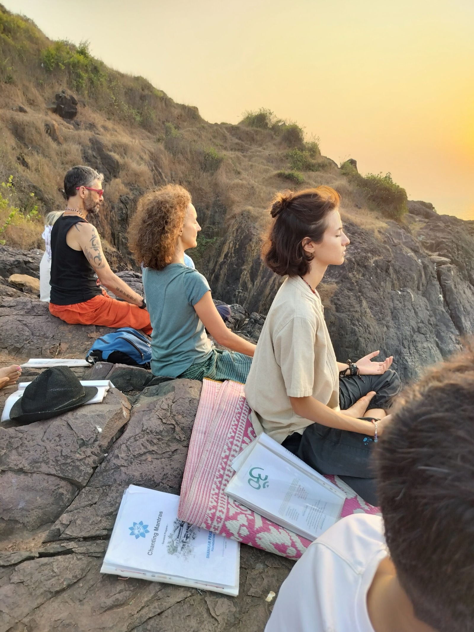 Sunset meditation on the rocks by the sea near Gokarna