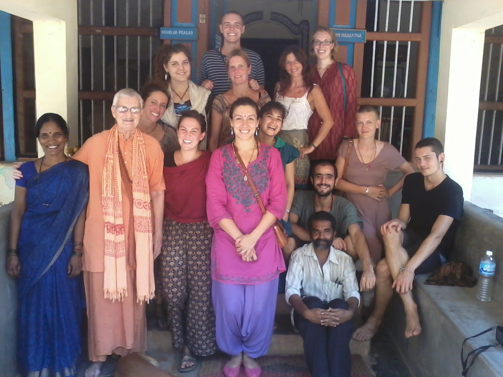 Students and Swamiji on the heritage-home steps